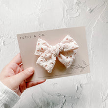 Load image into Gallery viewer, Petit &amp; Co. Mia Eyelet Bow

