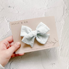 Load image into Gallery viewer, Petit &amp; Co. Swiss Dot Pinwheel Bow
